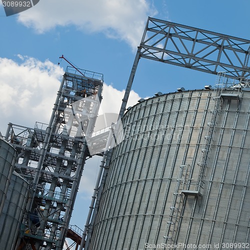 Image of Towers of grain drying enterprise at sunny day