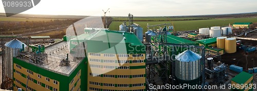 Image of Towers of grain drying enterprise at sunny day