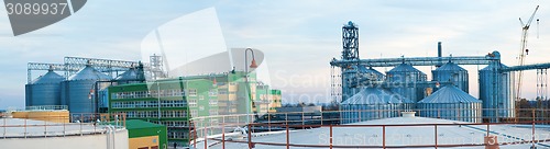 Image of Towers of grain drying enterprise at sunny day