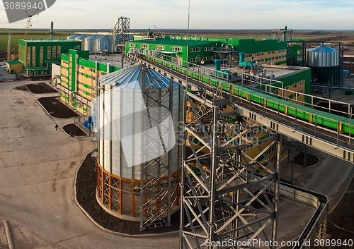 Image of Towers of grain drying enterprise at sunny day