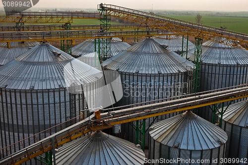 Image of Towers of grain drying enterprise at sunny day