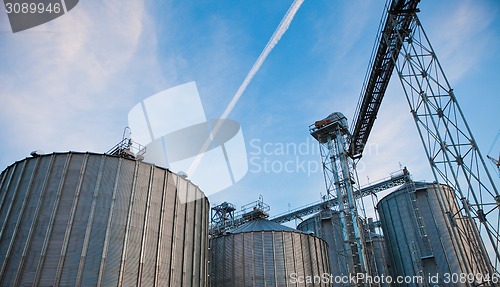 Image of Towers of grain drying enterprise at sunny day