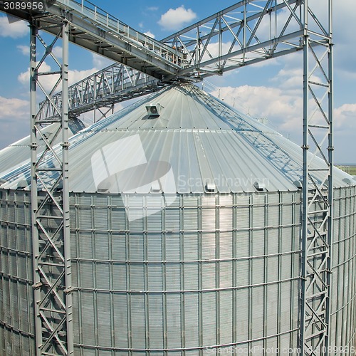 Image of Towers of grain drying enterprise at sunny day