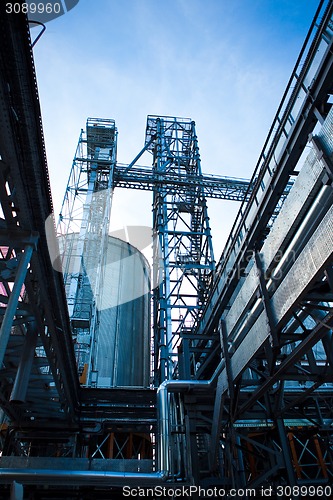 Image of Towers of grain drying enterprise at sunny day