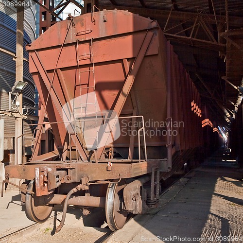 Image of Freight train with hopper cars.