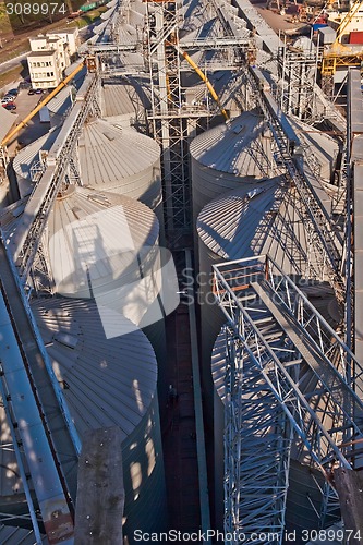 Image of Towers of grain drying enterprise at sunny day