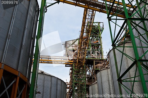 Image of Towers of grain drying enterprise at sunny day