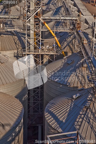 Image of Towers of grain drying enterprise at sunny day