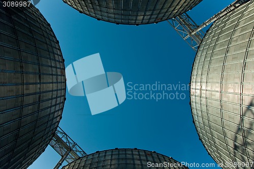 Image of Towers of grain drying enterprise at sunny day