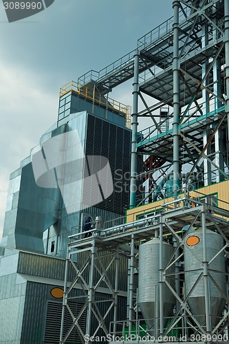 Image of Towers of grain drying enterprise at sunny day