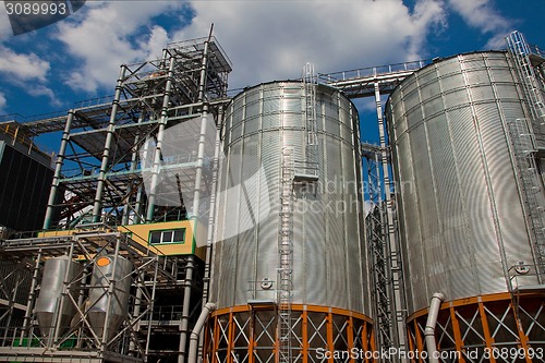 Image of Towers of grain drying enterprise at sunny day