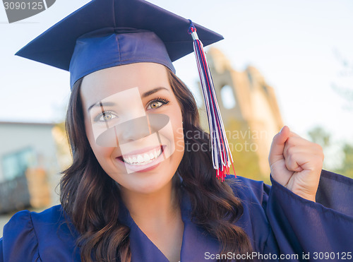 Image of Happy Graduating Mixed Race Woman In Cap and Gown