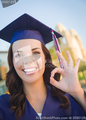 Image of Happy Graduating Mixed Race Woman In Cap and Gown