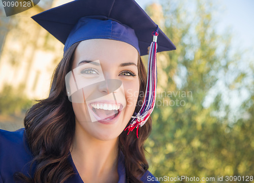 Image of Happy Graduating Mixed Race Woman In Cap and Gown