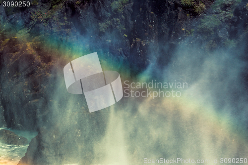 Image of Rainbow over waterfall