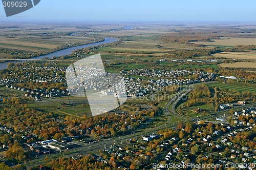 Image of Aerial view of suburban neighborhood near highway