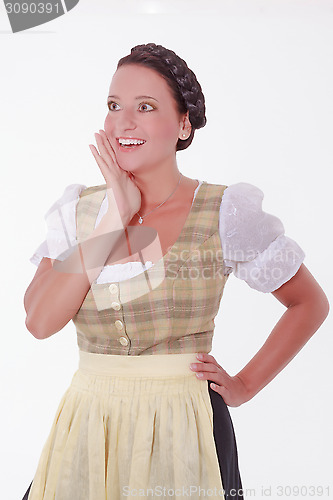 Image of Laughing young Bavarian woman in dirndl