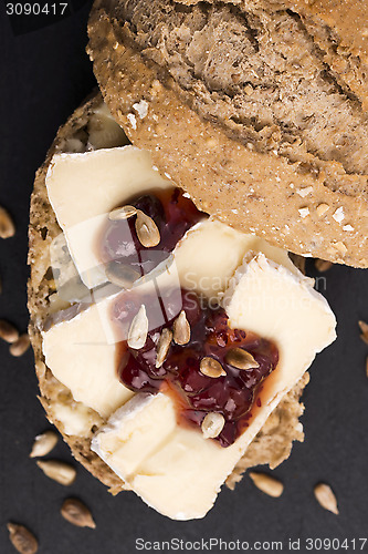 Image of bread served with camembert and cranberry