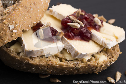 Image of bread served with camembert and cranberry