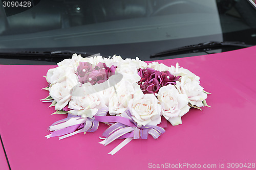 Image of pink wedding car