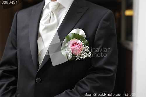 Image of Groom with Rose