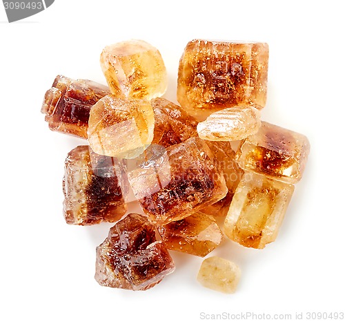 Image of Brown caramelized sugar cubes on a white background 