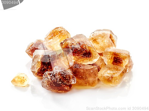 Image of Brown caramelized sugar cubes on a white background 