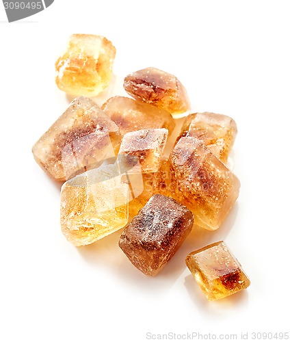 Image of Brown caramelized sugar cubes on a white background 