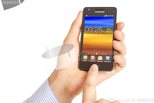 Image of Hand holding the Samsung Galaxy S2