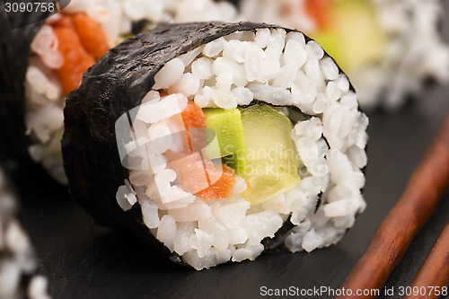 Image of Salmon rolls served on a plate