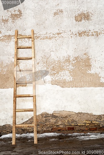 Image of weathered stucco brick wall 