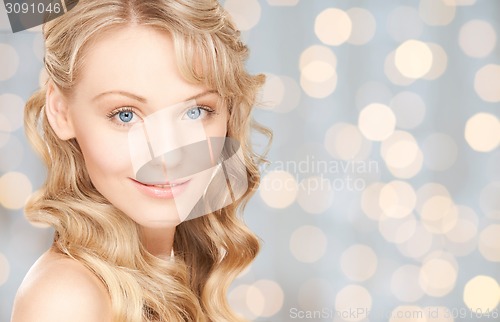 Image of face of beautiful young happy woman with long hair