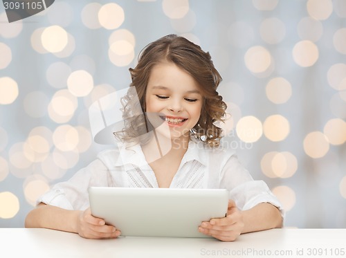 Image of happy smiling girl with tablet pc computer