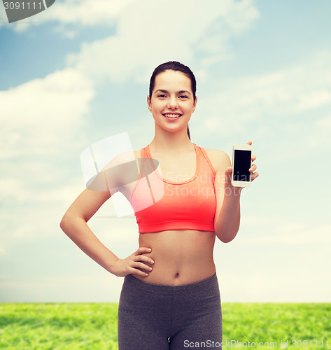 Image of sporty woman with smartphone