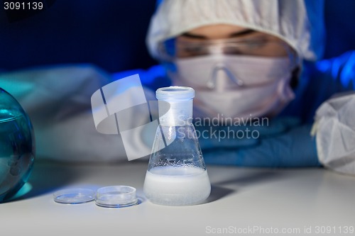 Image of close up of scientist making test in lab