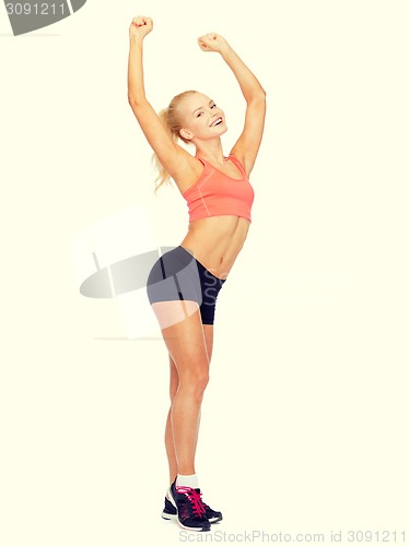 Image of beautiful sporty woman dancing