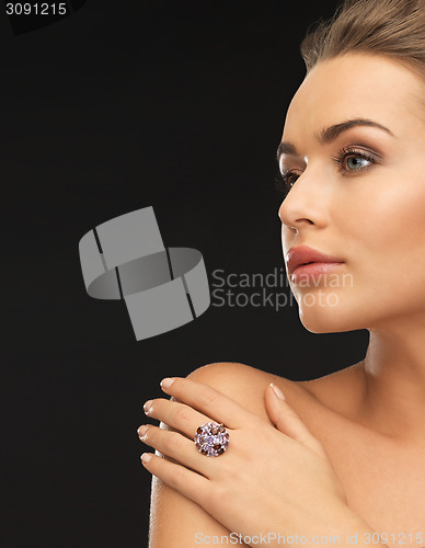 Image of woman with cocktail ring