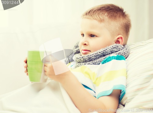 Image of ill boy with flu at home