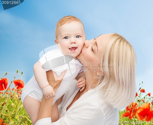 Image of happy mother with baby over natural background