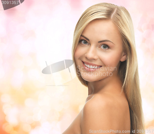 Image of face of beautiful young happy woman with long hair