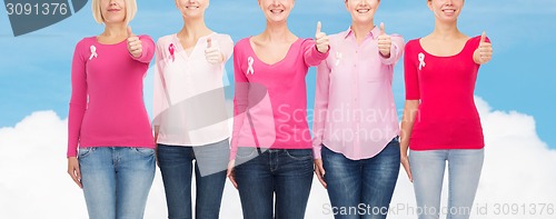 Image of close up of women with cancer awareness ribbons