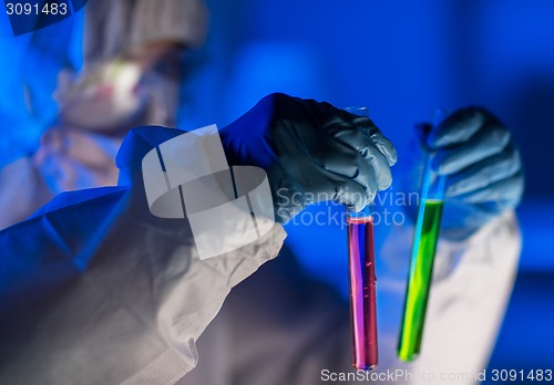 Image of close up of scientist making test in laboratory