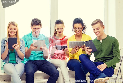 Image of smiling students with tablet pc computer