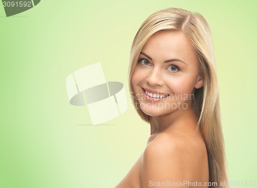 Image of face of beautiful young happy woman with long hair