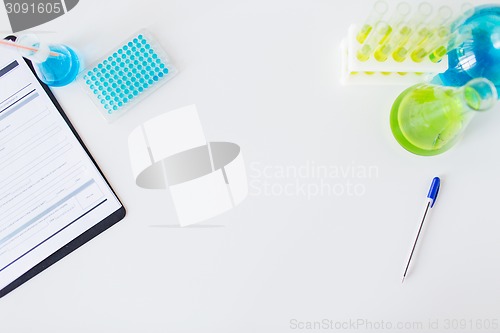 Image of close up of scientific laboratory table with stuff