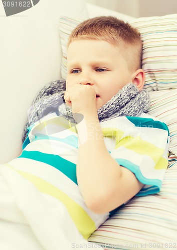 Image of ill boy with flu at home