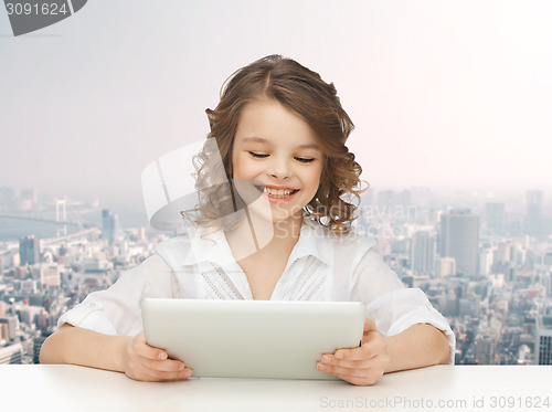 Image of happy smiling girl with tablet pc computer