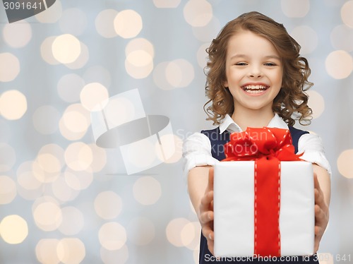 Image of happy smiling girl with gift box