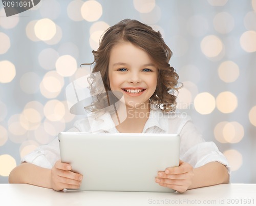 Image of happy smiling girl with tablet pc computer