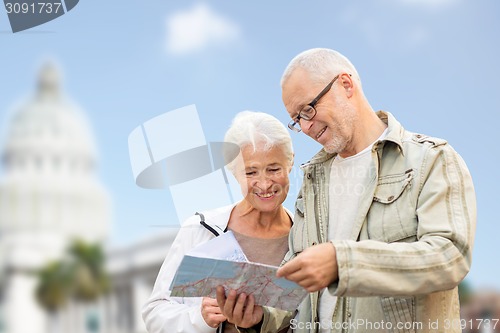 Image of couple with map over washington white house